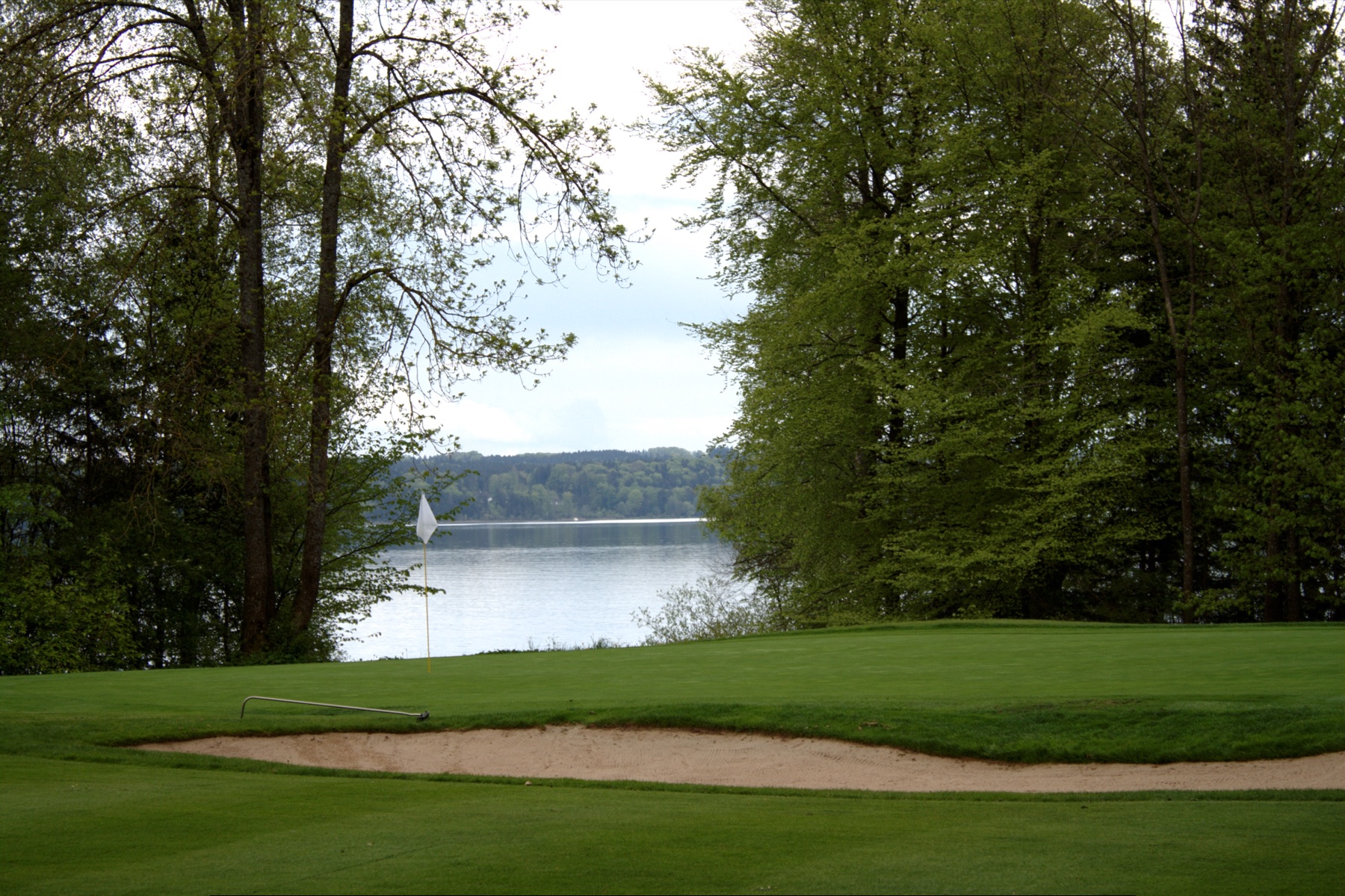 A green at Golf-Club Feldafing beside Lake Starnberg