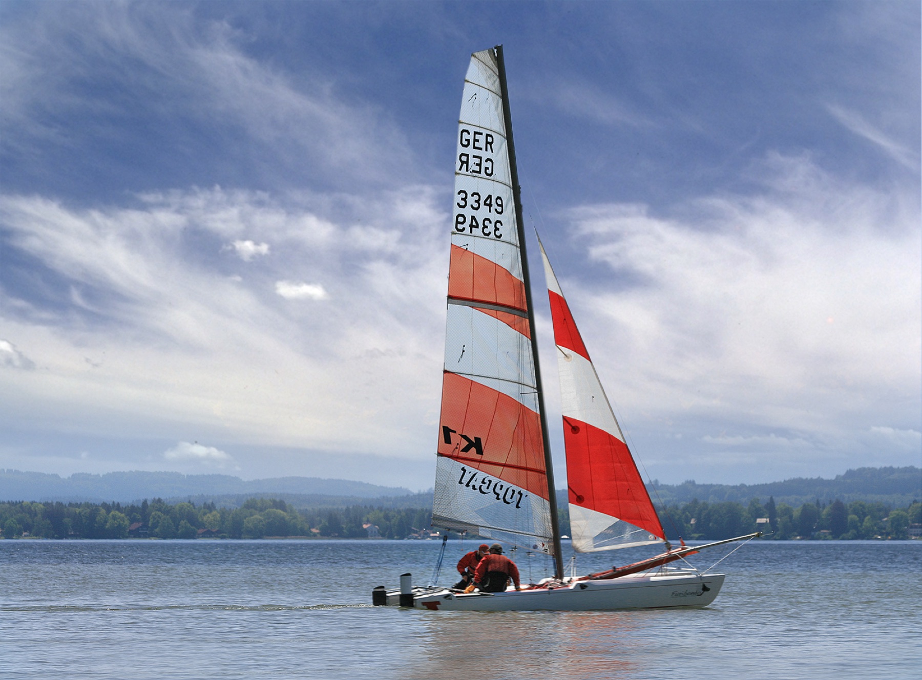 A catamaran sailing across Lake Starnberg